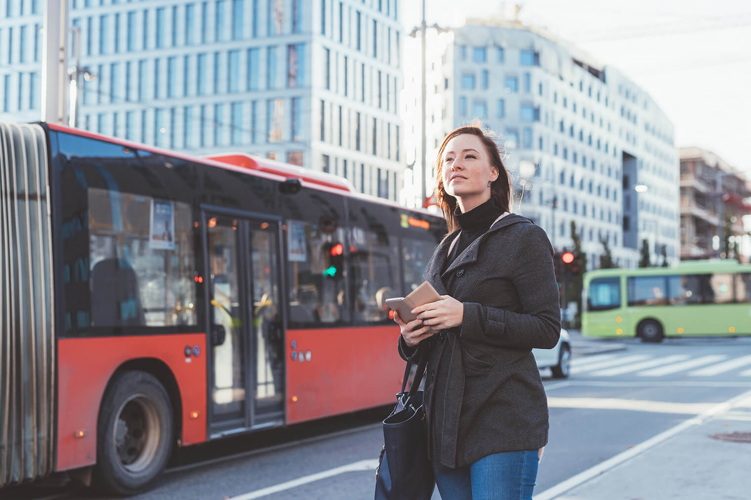 young-woman-outdoor-waiting-bus-stop-2022-01-28-20-52-23-utc.jpg